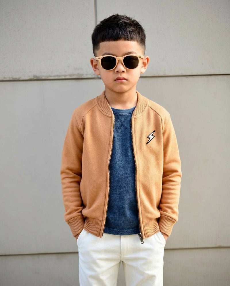 Boy wearing Wild Littles camel zip cardigan