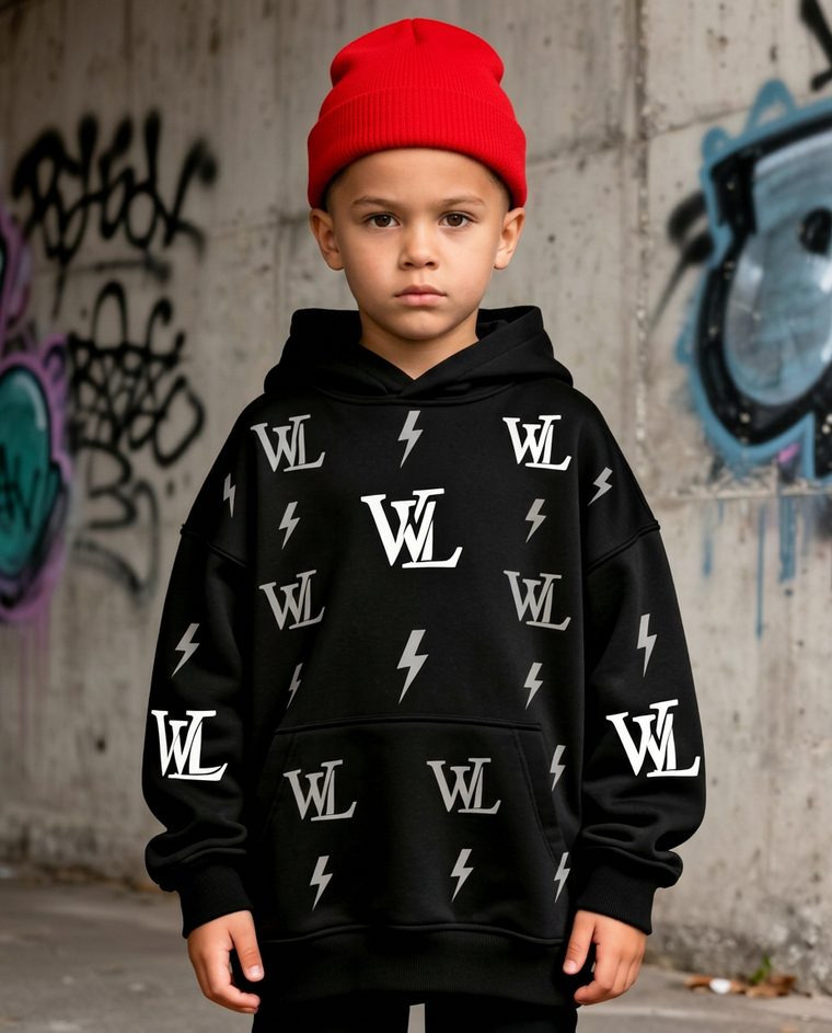Kid wearing beige Wild Littles bolt graphic tee
