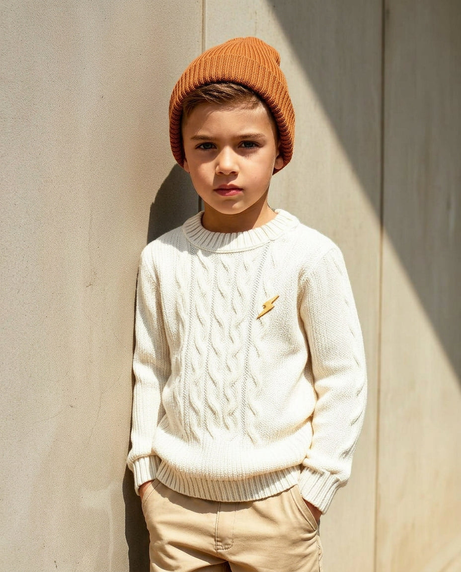 Boy wearing Wild Littles cable knit sweater